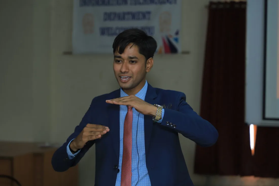 Nirmal Rabari speaking during a session
